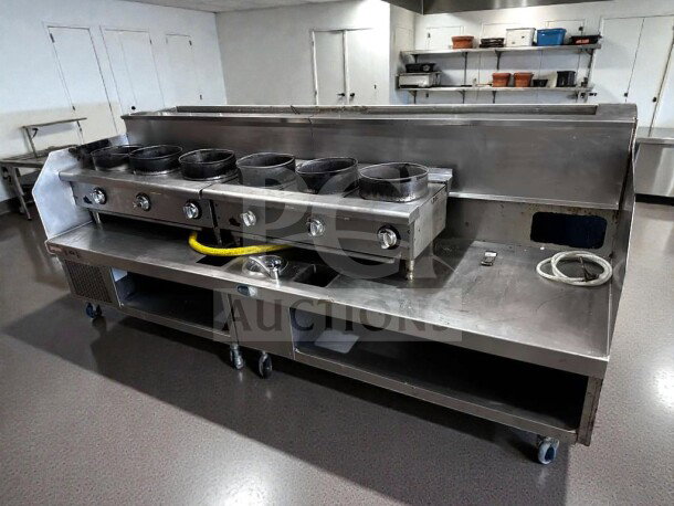 Immaculate commercial 6-burner wok system, stainless steel with refrigerated top, gas-operated, fully tested, unbranded.