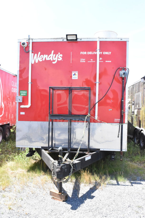 2022 Rock Solid Cargo 8.5x28 food trailer, red, Wendy's branding, delivery only, visible propane hookup, VIN: 7H2BE2831ND043576.