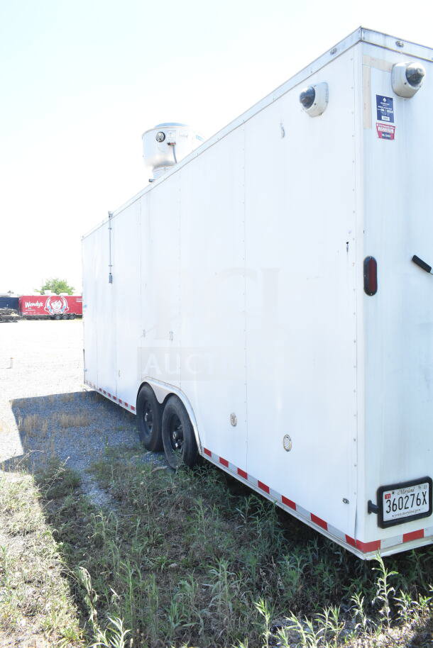 Diamond Cargo 8.5'x24' food trailer, white exterior, dual axle, vent system on roof, VIN: 53NBE2429M1089847.