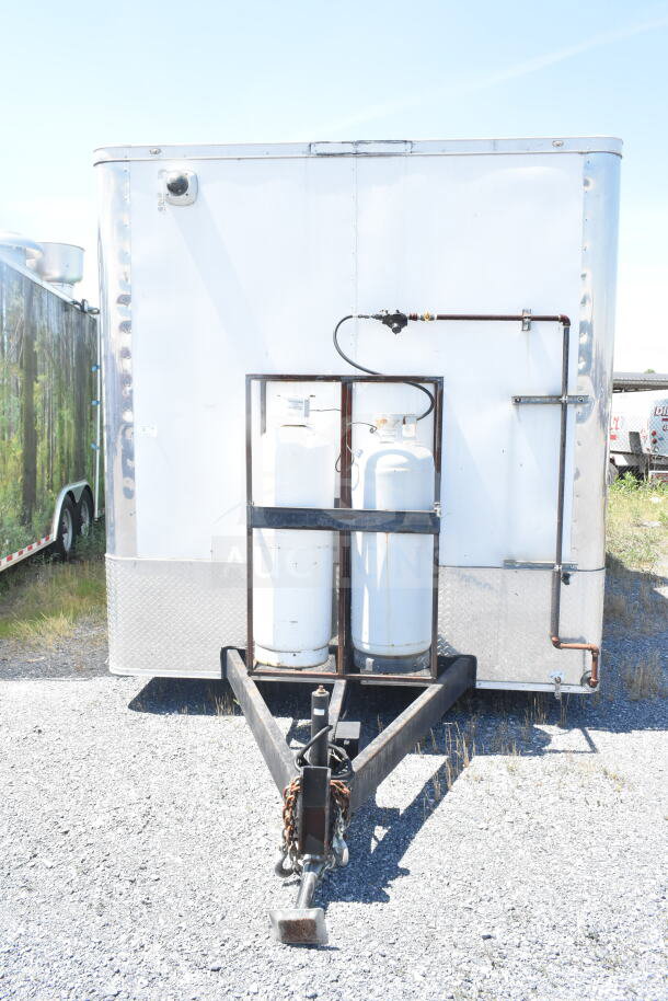 Diamond Cargo 8.5'x24' food trailer with dual propane tanks, VIN: 53NBE2429M1089847, in good condition.