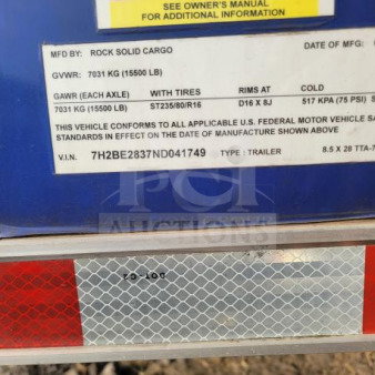 Rock Solid Cargo food trailer VIN plate shows specs: GVWR 7031 kg, ST235/80/R16 tires, Rims D16x8J, VIN 7H2BE2837ND041749.