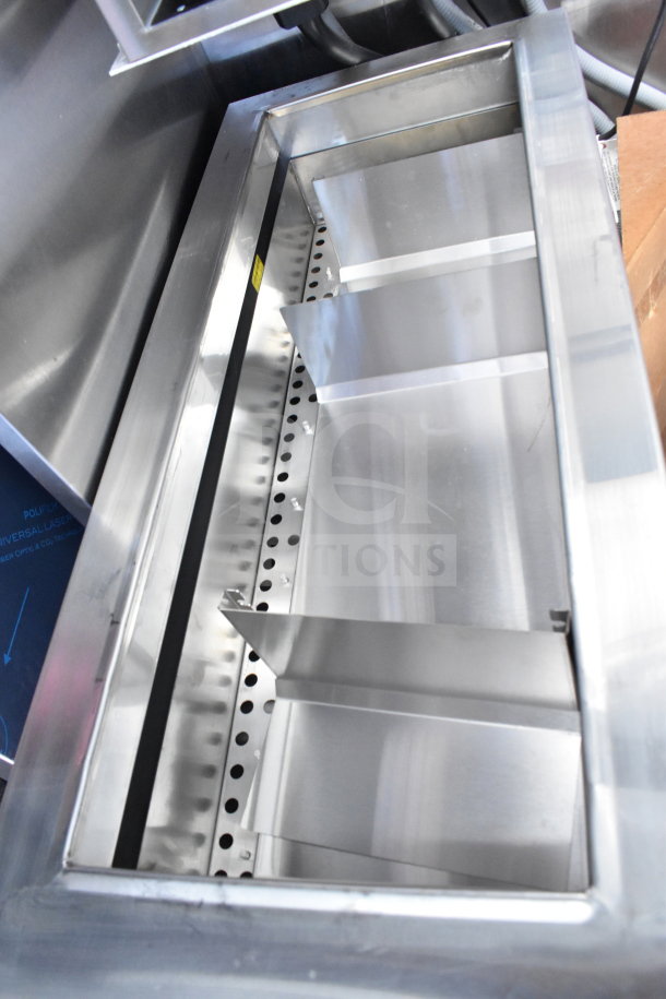 Stainless steel interior of 2022 Rock Solid Cargo 8.5x28 Wendy's Food Trailer, featuring high-quality construction.