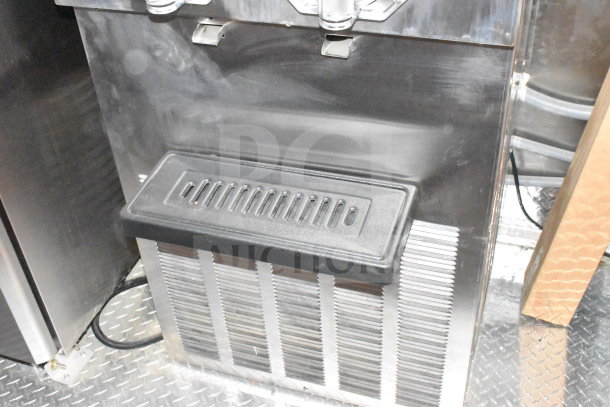 2022 Rock Solid Cargo 8.5x28 Wendy's Food Trailer interior, featuring refrigeration unit vent grille. Clean condition.