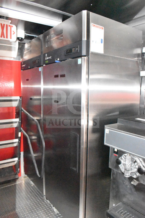 2022 Rock Solid Cargo 8.5x28 Wendy's food trailer interior with commercial refrigeration units and stainless steel equipment.