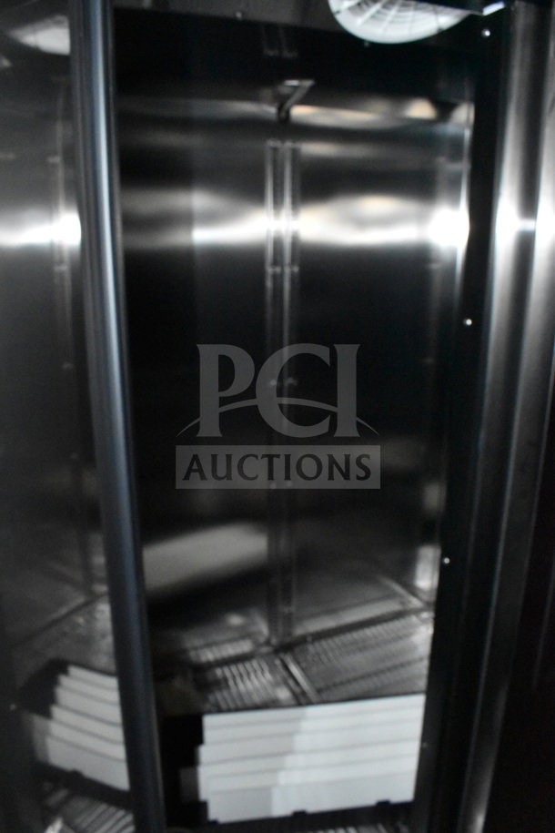 2022 Rock Solid Cargo 8.5x28 food trailer interior, includes CaptiveAire grease hood, Garland clamshell, and refrigeration suite.