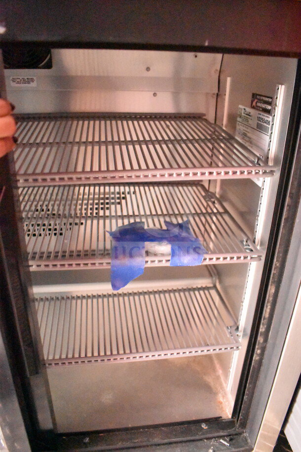 2022 Rock Solid Cargo 8.5x28 Wendy's Food Trailer interior showing True refrigeration shelving, in good condition with tags.