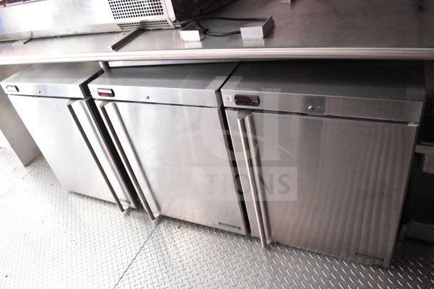 2022 Rock Solid Cargo 8.5x28 food trailer refrigeration suite, featuring Hoshizaki stainless steel refrigerators, excellent condition.