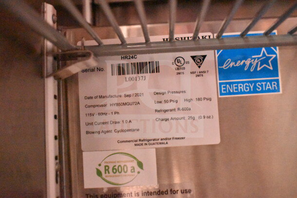 Serial label inside Wendy's Food Trailer with details: Energy Star, compressor specs, refrigerant type R-600a, and manufacture date Sep 2021.