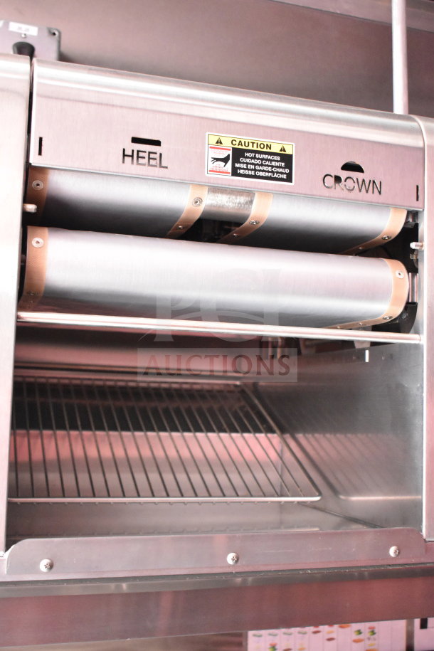 Interior of a 2022 Rock Solid Cargo Wendy's food trailer featuring a CaptiveAire grease hood.