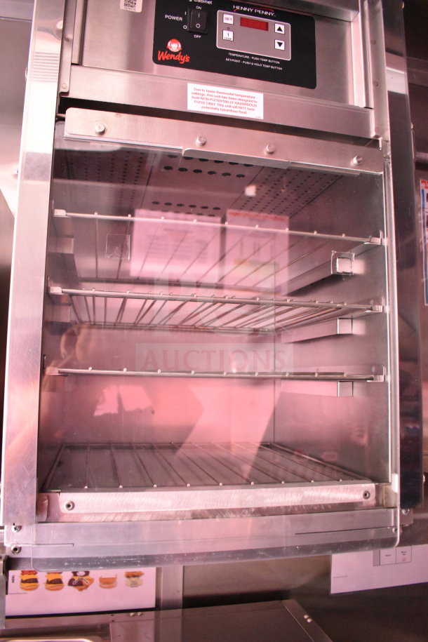 2022 Wendy's food trailer Henny Penny fryer, stainless steel, labeled controls, multiple shelves.