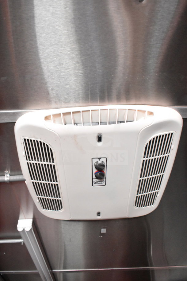Interior view of a 2022 Rock Solid Cargo 8.5x28 Wendy's Food Trailer with ventilation unit.