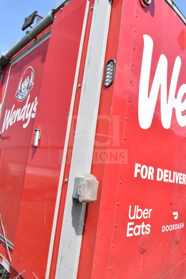 2022 Rock Solid Cargo 8.5x28 Wendy's food trailer, featuring CaptiveAire grease hood, Garland clamshell, Henny Penny fryer.