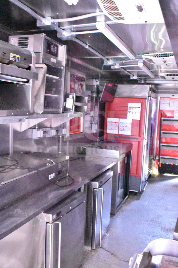 Titanium Cargo Trailers 8.5'x28' Wendy's food trailer, features CaptiveAire grease hood, Taylor shake machine, Henny Penny fryer, refrigeration suite.