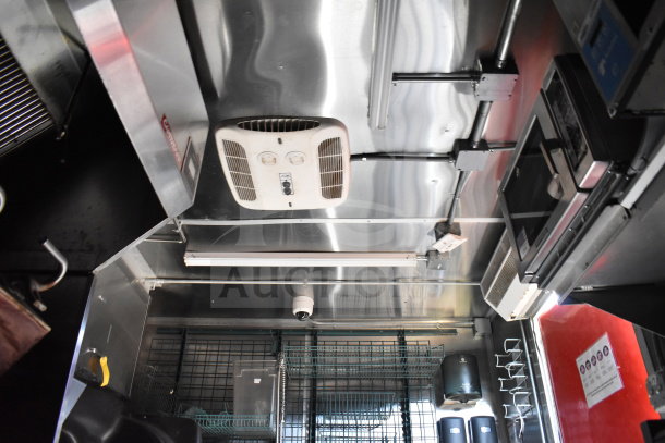 Titanium Cargo Trailers 8.5'x28' Wendy's Food Trailer interior, featuring a CaptiveAire grease hood.