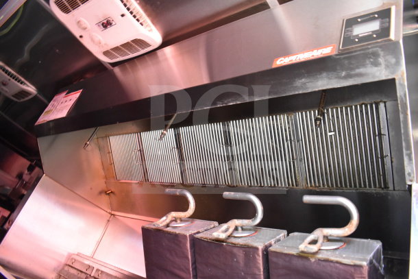 Titanium Cargo 8.5'x28' food trailer interior with CaptiveAire grease hood, Taylor shake machine, Henny Penny fryer, refrigeration units.