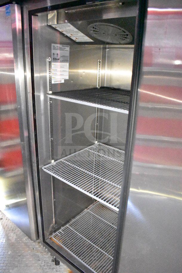 Titanium Cargo Trailers food trailer interior showing a Turbo Air refrigeration unit with wire shelves.