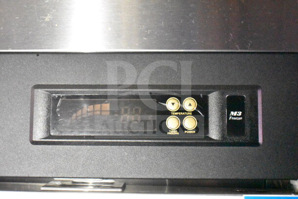 Display panel of M3 Freezer in a Titanium Cargo Trailers 8.5'x28' food trailer, featuring temperature controls.