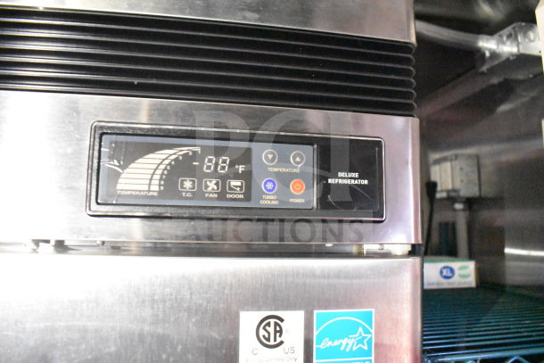 Titanium Cargo Trailers 8.5'x28' food trailer refrigeration unit display showing temperature controls and Energy Star label.