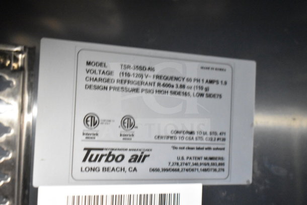 Label on Turbo Air refrigeration unit for a Titanium Cargo Trailers 8.5'x28' food trailer. Contains model and specifications.