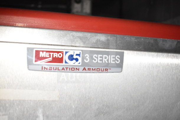 Titanium Cargo Trailers 8.5'x28' food trailer, featuring Metro C5 3 Series Insulation Armour tag, durable construction.