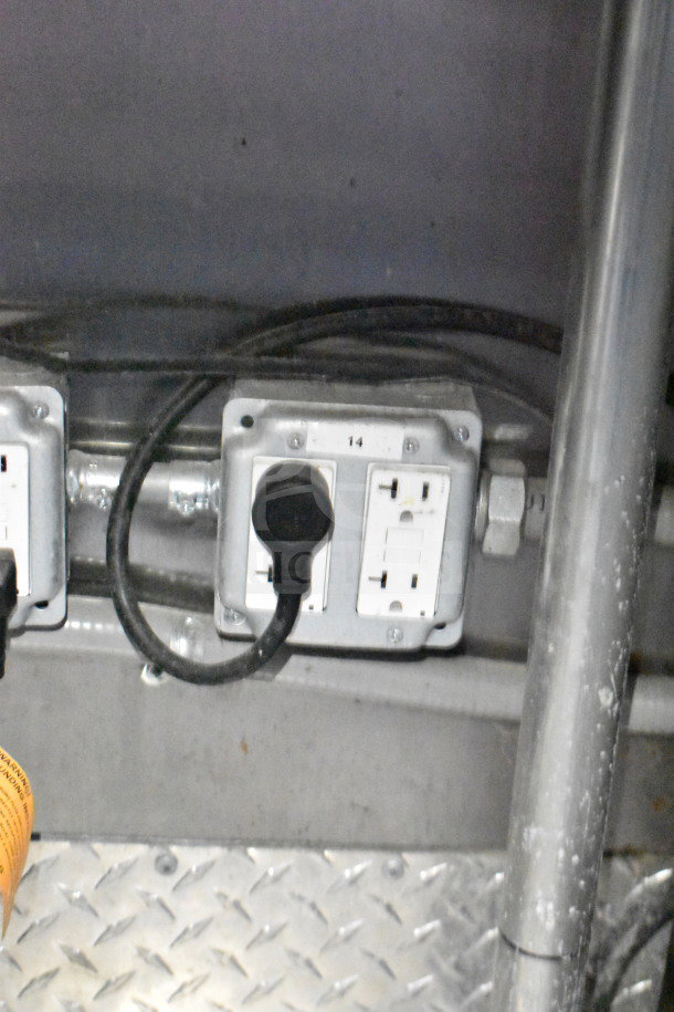 Titanium Cargo Trailers 8.5'x28' Wendy's Food Trailer interior, showing electrical outlets.