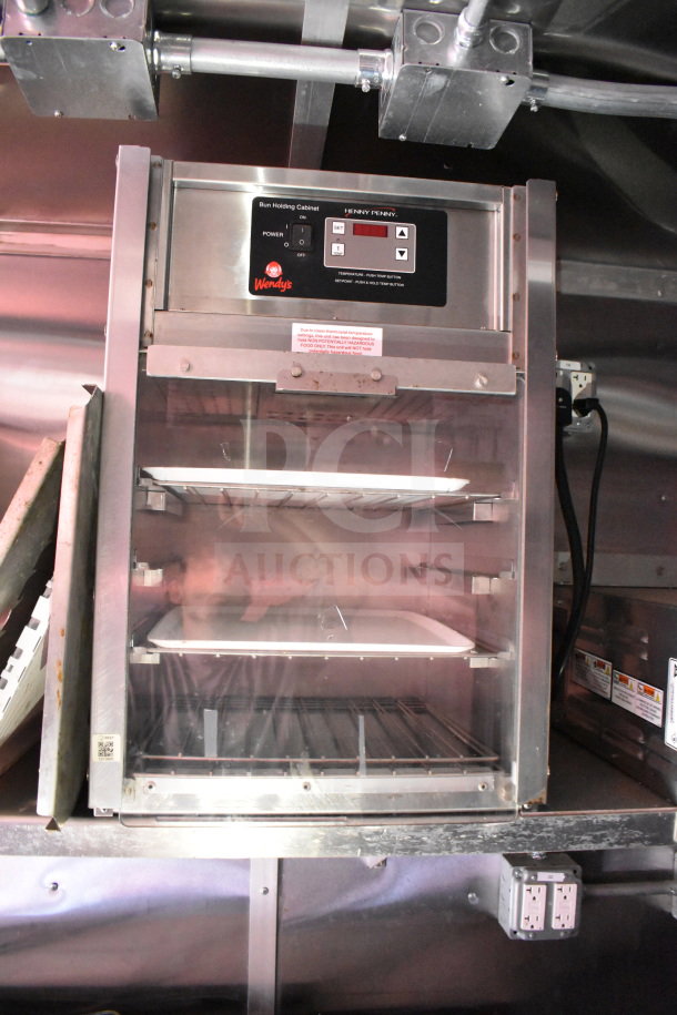 Wendy's Henny Penny Bun Holding Cabinet in Titanium Cargo Trailer, featuring digital controls and stainless steel construction.