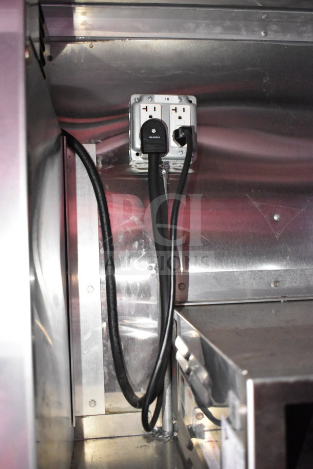 2021 Titanium Cargo Trailers Wendy's Food Trailer interior showing electrical outlet and wiring.