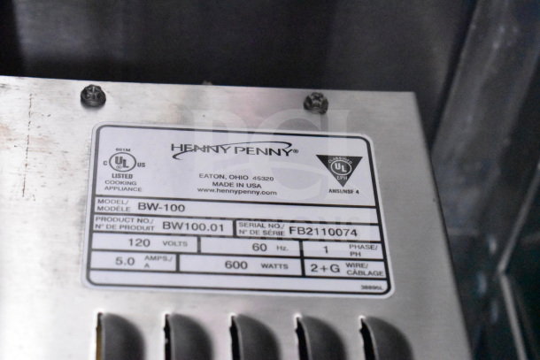 Label on Henny Penny appliance, model BW-100, serial FB2110074, 120V, 60Hz, 600W, Eaton, Ohio, USA made.
