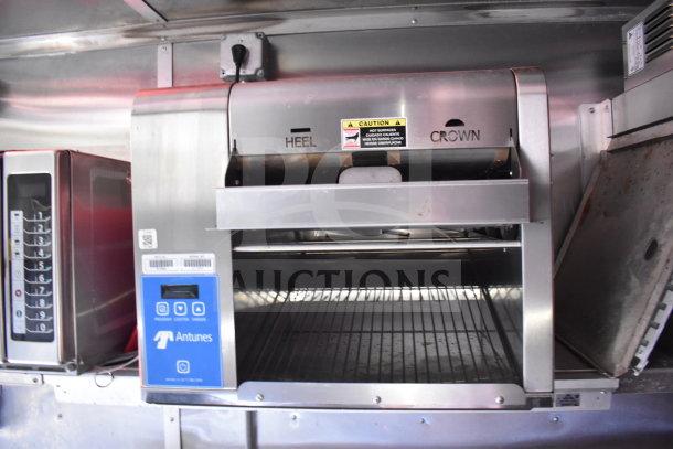 2021 Titanium Cargo Trailer 8.5'x28' interior showing Antunes toaster and control panel, part of Wendy's food setup.