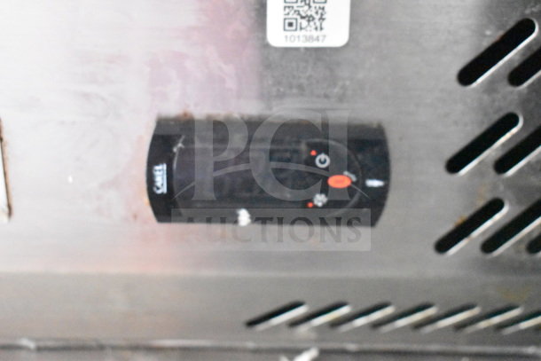Digital temperature control panel on the 2021 Titanium Cargo Trailers food trailer. QR code and numeric display visible.