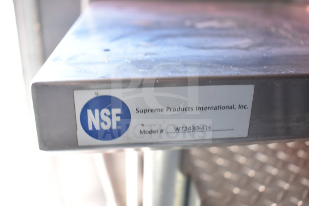 NSF-certified Supreme Products International model WT2430-416 label on stainless steel surface, indicating food safety compliance.