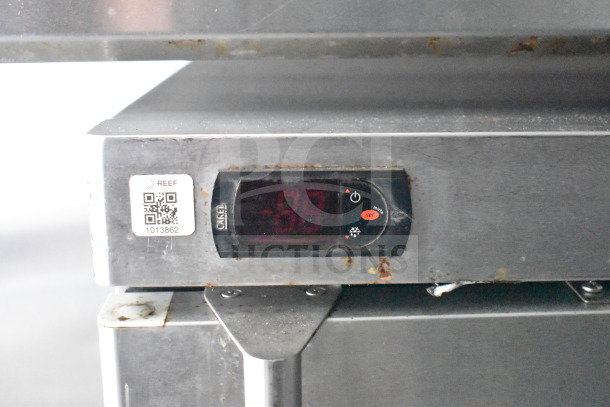 2021 Titanium Cargo Trailers 8.5'x28' food trailer control panel, features digital display and REEF label with QR code.