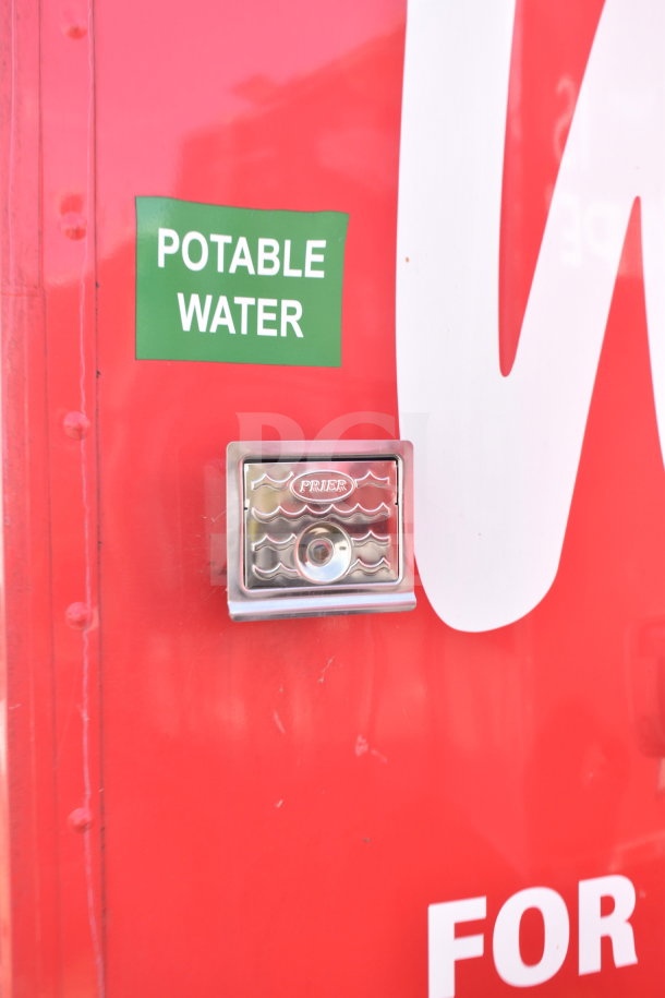 2021 Titanium Cargo Trailer, red exterior with "Potable Water" label, featuring a Prier water access point.