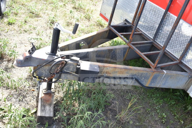 2021 Titanium Cargo Trailer hitch detail showing wear and rust; part of Wendy’s food trailer setup.