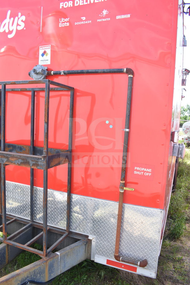 2021 Titanium Cargo 8.5'x28' Wendy's Food Trailer, visible propane shut-off and delivery logos.