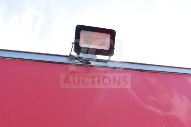 2021 Titanium Cargo Trailers 8.5'x28' Wendy's Food Trailer, exterior red panel with mounted 50W IP66 light fixture.