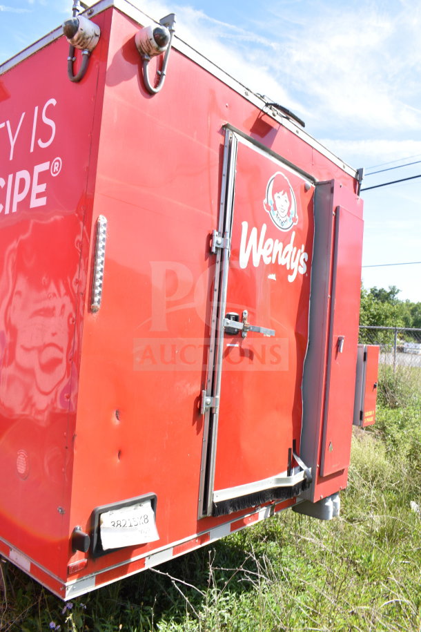 2021 Titanium Cargo Trailers 8.5'x28' Wendy's food trailer, visible exterior, Wendy's branding, street-ready.