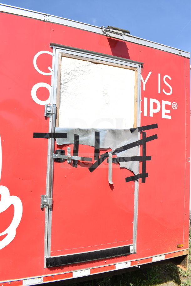 2021 Titanium Cargo Trailers 8.5'x28' food trailer with red exterior, visible door damage, and taped repairs.