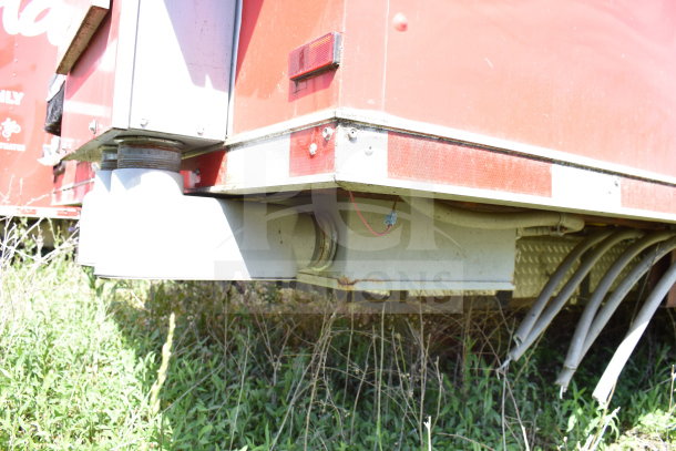 2021 Titanium Cargo 8.5'x28' Wendy's Food Trailer exterior, showing wiring and structural detail.