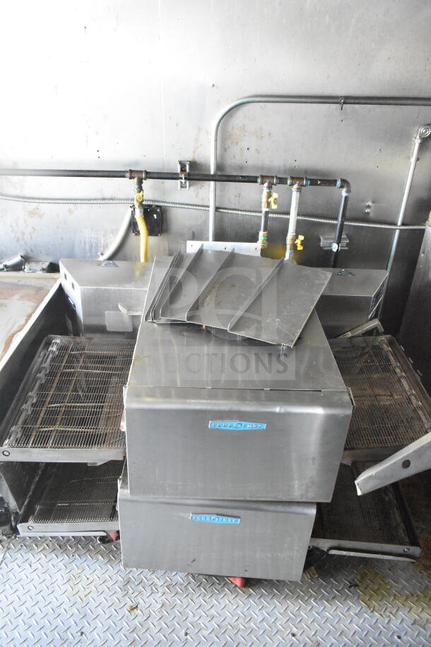 2021 Diamond Cargo food trailer interior featuring Turbochef rapid cook ovens and CaptiveAire grease hood in used condition.