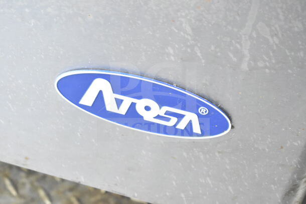 Label on 2021 Diamond Cargo food trailer indicating Atosa refrigeration. Features Turbochef ovens, grease hood.