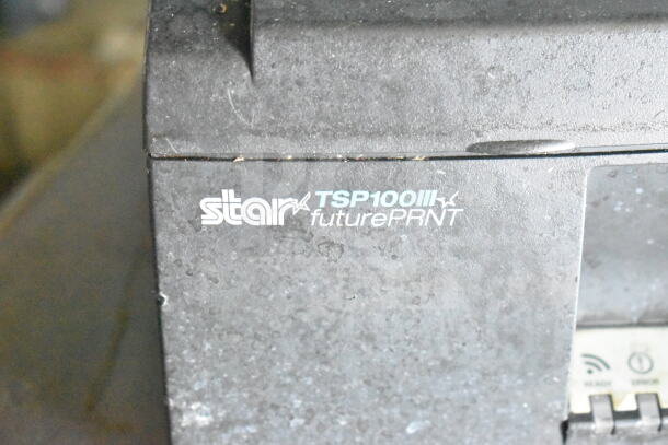 Star TSP100III futurePRNT printer in worn condition, showing brand and model text on the surface.