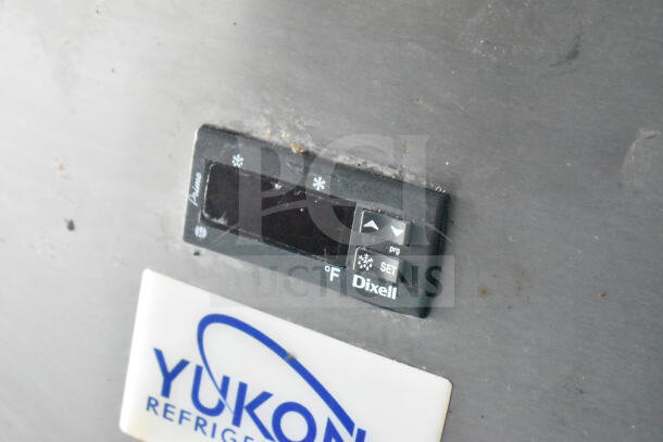 Dixell temperature control panel and Yukon Refrigeration label on Diamond Cargo food trailer interior wall.