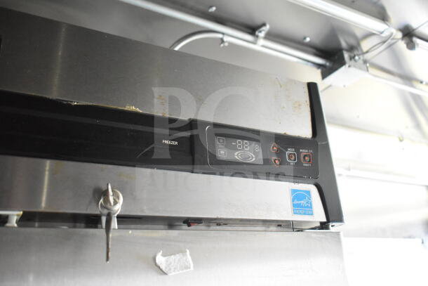 2021 Diamond Cargo food trailer refrigeration unit, Energy Star rated, digital controls, visible wear, key lock feature.