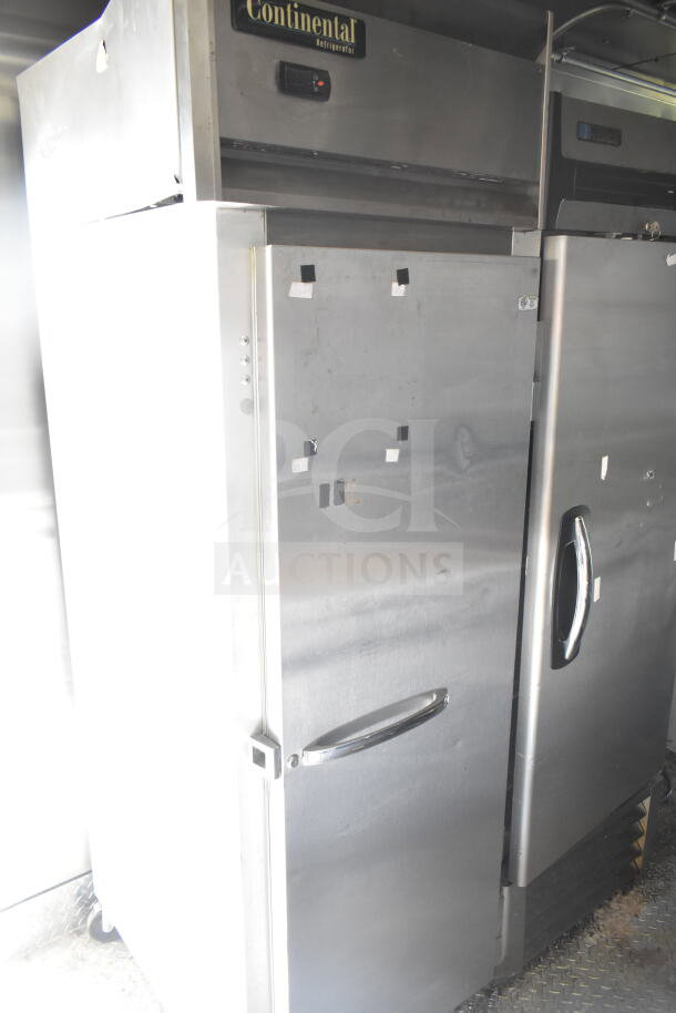 2021 Diamond Cargo 8.5'x24' food trailer featuring Continental refrigerator, used condition, includes CaptiveAire grease hood.