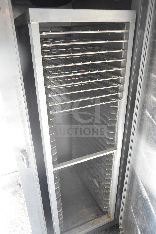 2021 Diamond Cargo food trailer interior showing stainless steel shelving racks.