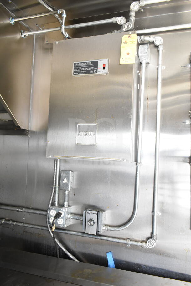 Interior of a 2021 Diamond Cargo food trailer showing ANSUL fire suppression system, electrical outlets, and ventilation controls.