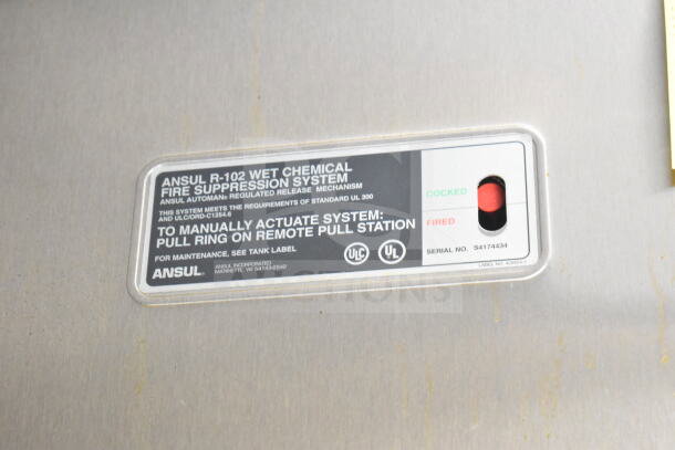 Label of Ansul R-102 wet chemical fire suppression system inside 2021 Diamond Cargo food trailer. Serial No. S4174434.