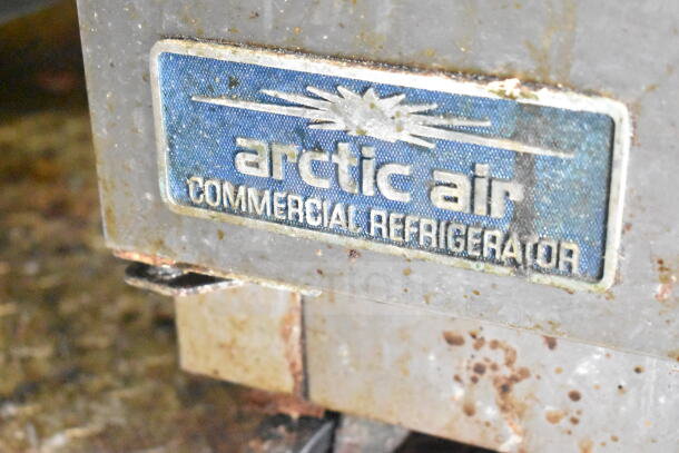 Arctic Air commercial refrigerator label on the 2021 Diamond Cargo food trailer. Visible rust and wear present.