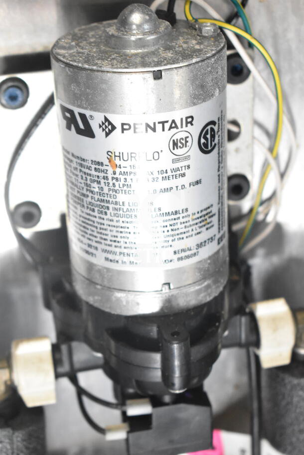 Pentair Shurflo pump with visible specs: 115VAC, 0.9 amps, 104 watts. Features include UL, NSF, and CSA markings. Model 362757.